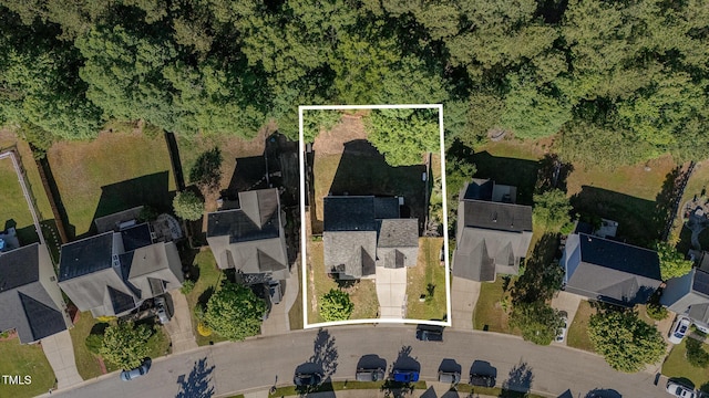 1148 Dexter Ridge Dr, Holly Springs, NC 27540 - aerial view of residential area featuring property boundaries highlighted