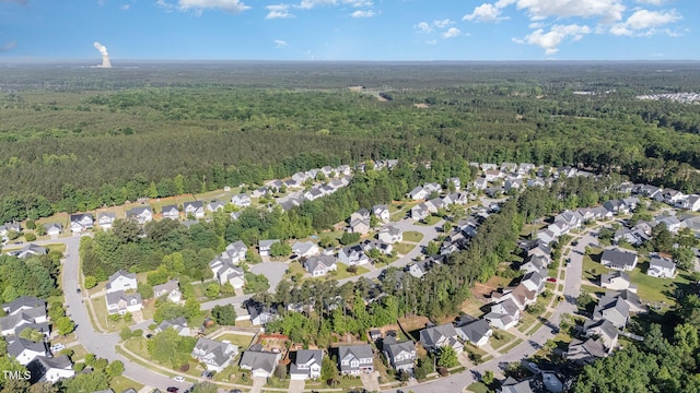 1148 Dexter Ridge Dr, Holly Springs, NC 27540 - view of property location featuring a forest and nearby suburban area