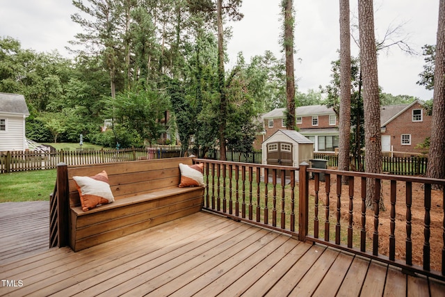 1702 Chamberlain Dr NW, Wilson, NC 27896 - wooden deck featuring a storage shed and a fenced backyard