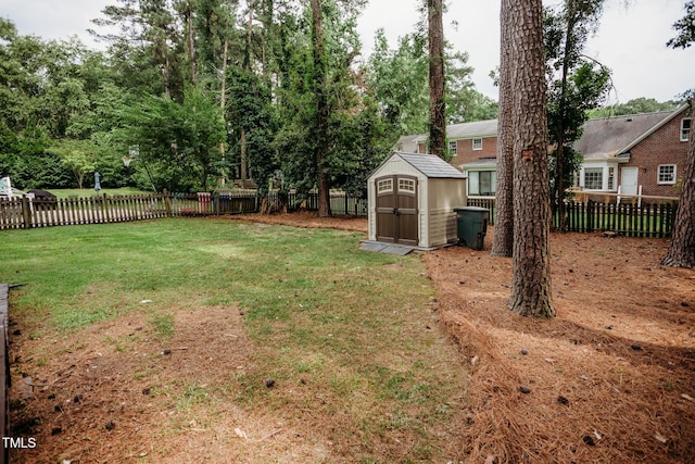 1702 Chamberlain Dr NW, Wilson, NC 27896 - fenced backyard featuring a storage shed