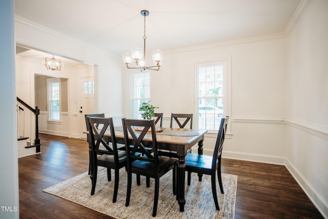 1702 Chamberlain Dr NW, Wilson, NC 27896 - dining room with a chandelier, dark wood finished floors, crown molding, and stairway