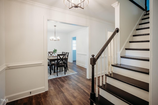 1702 Chamberlain Dr NW, Wilson, NC 27896 - stairway with a chandelier, crown molding, and wood finished floors