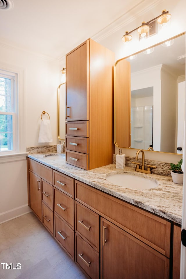 1702 Chamberlain Dr NW, Wilson, NC 27896 - full bathroom with double vanity and crown molding