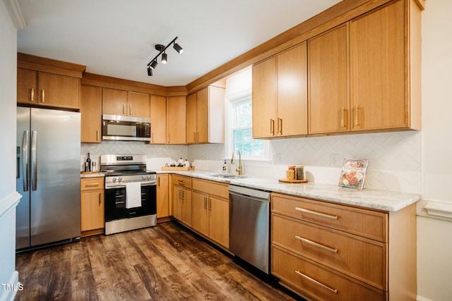 1702 Chamberlain Dr NW, Wilson, NC 27896 - kitchen featuring stainless steel appliances, dark wood-style flooring, light stone countertops, and backsplash