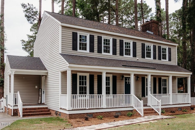 1702 Chamberlain Dr NW, Wilson, NC 27896 - view of front of house featuring crawl space, covered porch, a chimney, and roof with shingles