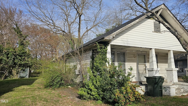 411 Fairview Ave SW, Wilson, NC 27893 - view of front of property with a porch and a front yard