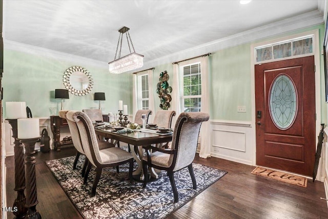 728 Opposition Way, Wake Forest, NC 27587 - dining space featuring dark wood finished floors, crown molding, and a wainscoted wall