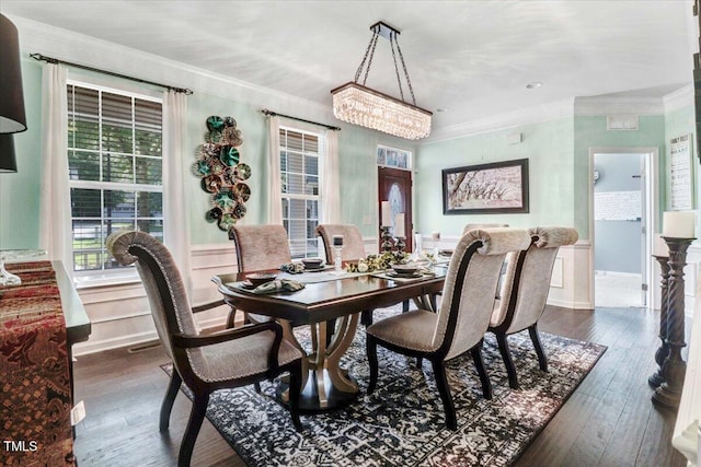 728 Opposition Way, Wake Forest, NC 27587 - dining room featuring crown molding, dark wood-style floors, a chandelier, and a wainscoted wall
