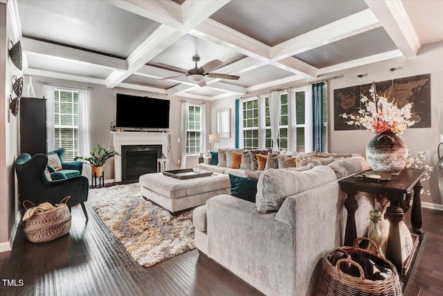 728 Opposition Way, Wake Forest, NC 27587 - living area with wood finished floors, a fireplace, ceiling fan, beamed ceiling, and coffered ceiling