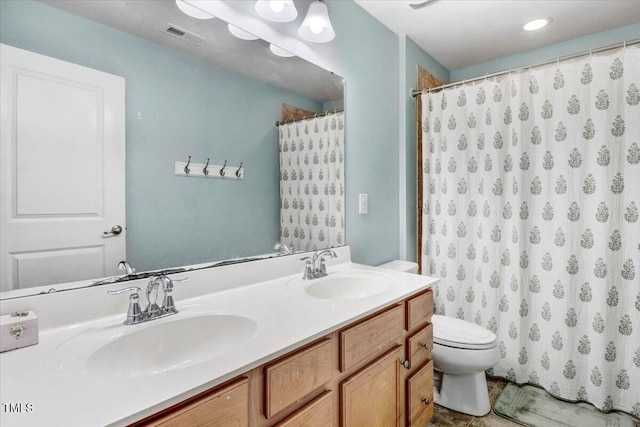 728 Opposition Way, Wake Forest, NC 27587 - bathroom featuring double vanity, a shower with shower curtain, and recessed lighting