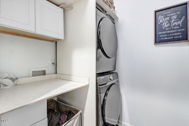728 Opposition Way, Wake Forest, NC 27587 - washroom with cabinet space and stacked washer / drying machine