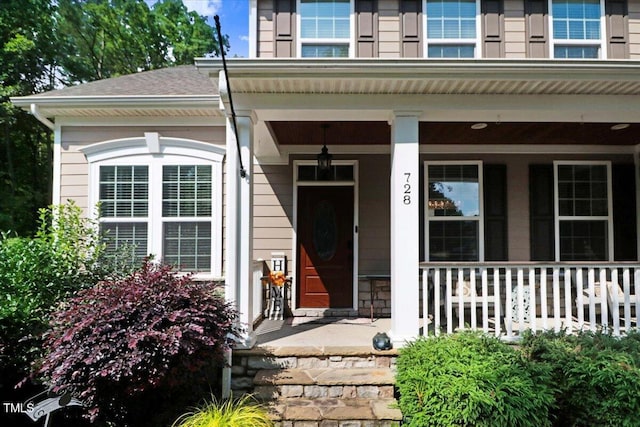 728 Opposition Way, Wake Forest, NC 27587 - doorway to property with a porch