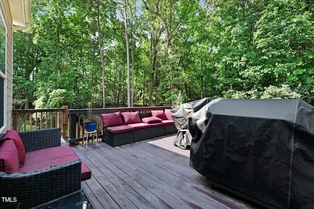 728 Opposition Way, Wake Forest, NC 27587 - wooden terrace with a grill, outdoor lounge area, and a view of trees
