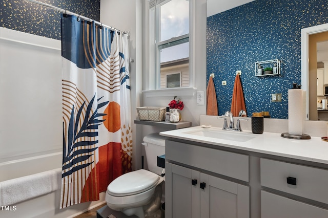 1104 Briar Gate Dr, Holly Springs, NC 27540 - bathroom with wallpapered walls, vanity, and shower / bath combo with shower curtain