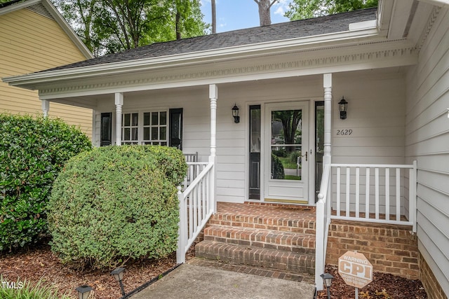 2629 Hiking Trl, Raleigh, NC 27615 - doorway to property with covered porch