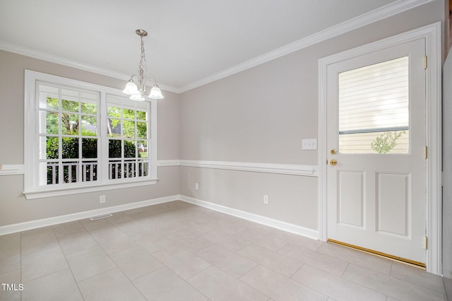 2629 Hiking Trl, Raleigh, NC 27615 - unfurnished dining area featuring a chandelier and ornamental molding