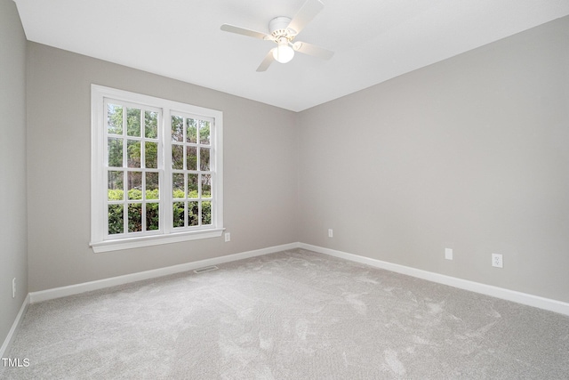 2629 Hiking Trl, Raleigh, NC 27615 - empty room with a ceiling fan and carpet floors