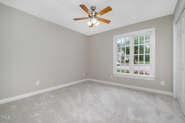 2629 Hiking Trl, Raleigh, NC 27615 - carpeted empty room featuring baseboards and ceiling fan