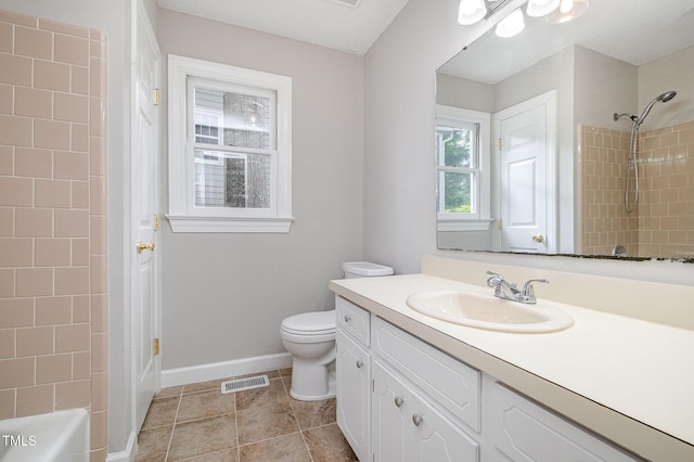 2629 Hiking Trl, Raleigh, NC 27615 - bathroom with vanity, washtub / shower combination, and tile patterned floors