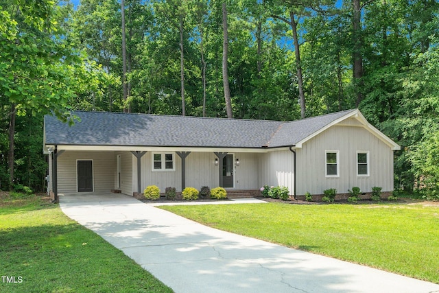 1308 Broken Branch Ct, Raleigh, NC 27610 - ranch-style home featuring concrete driveway, roof with shingles, an attached carport, and a front yard