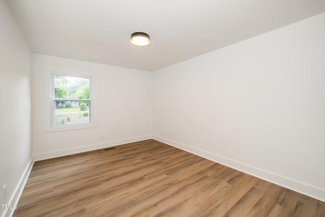 1308 Broken Branch Ct, Raleigh, NC 27610 - spare room with light wood finished floors and baseboards