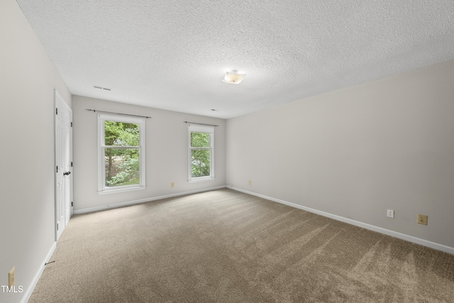 3517 Eden Croft Dr, Raleigh, NC 27612 - empty room with carpet flooring and a textured ceiling