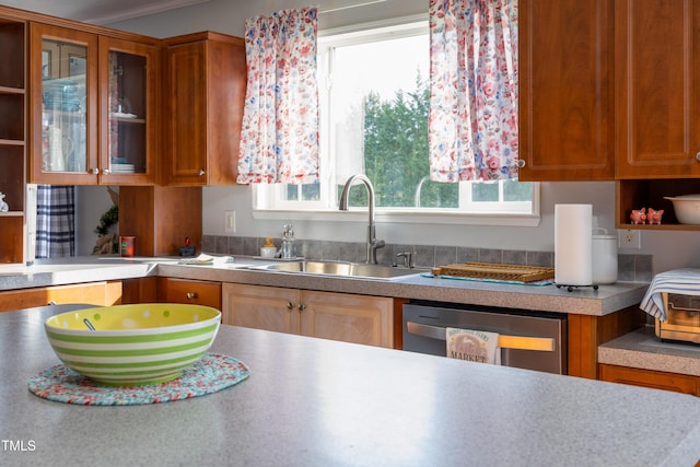 764 Olivers Grove Rd, Four Oaks, NC 27524 - kitchen featuring stainless steel dishwasher, healthy amount of natural light, glass insert cabinets, and light countertops