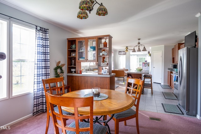 764 Olivers Grove Rd, Four Oaks, NC 27524 - dining room featuring light colored carpet