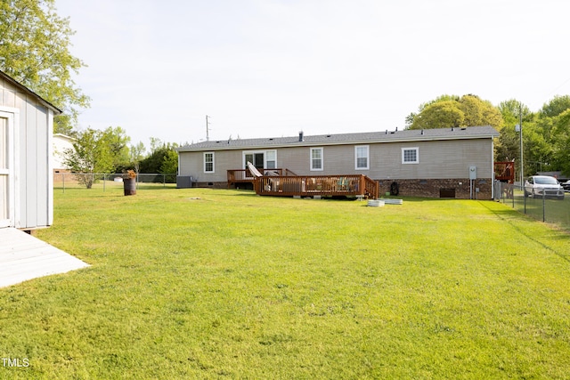 764 Olivers Grove Rd, Four Oaks, NC 27524 - rear view of property with crawl space, a deck, and a fenced backyard
