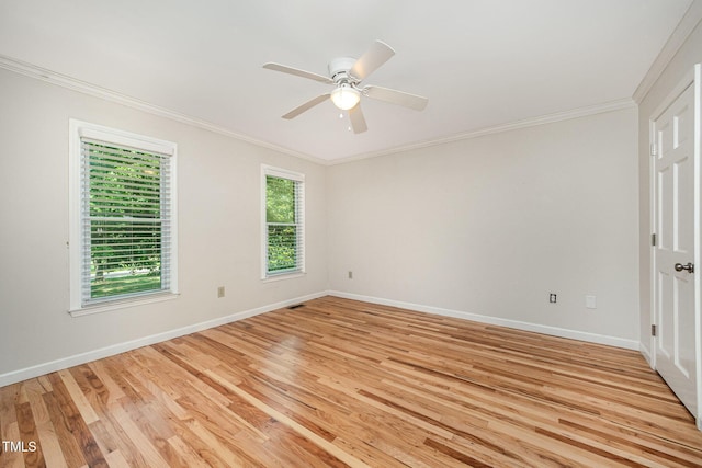 3913 Littlefield Ct, Raleigh, NC 27606 - empty room with light wood-style floors, crown molding, and a ceiling fan