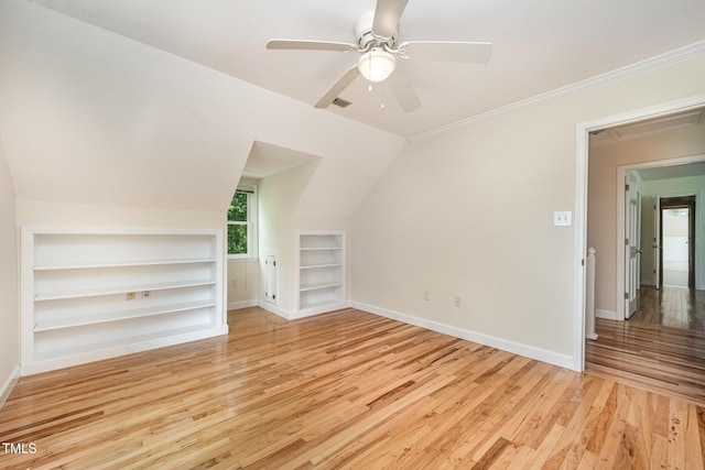 3913 Littlefield Ct, Raleigh, NC 27606 - bonus room featuring built in features, light wood-type flooring, ceiling fan, and vaulted ceiling