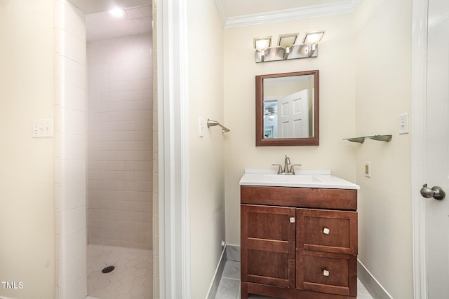 3913 Littlefield Ct, Raleigh, NC 27606 - bathroom with vanity, a tile shower, crown molding, and tile patterned floors