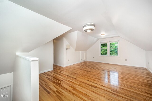 3913 Littlefield Ct, Raleigh, NC 27606 - bonus room featuring light wood finished floors and lofted ceiling