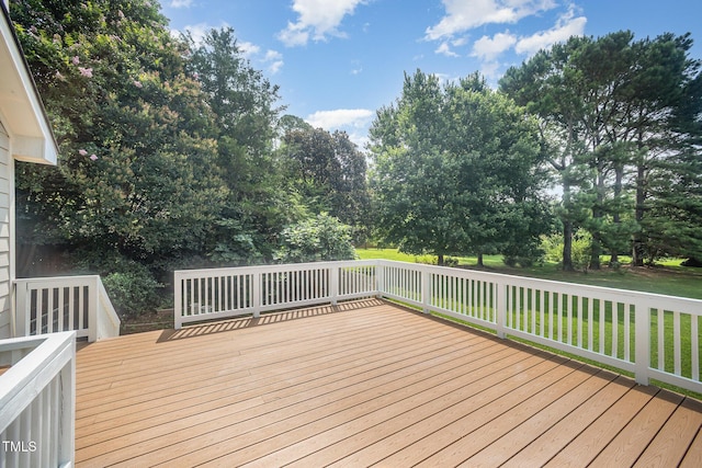 3913 Littlefield Ct, Raleigh, NC 27606 - wooden deck featuring view of scattered trees and a lawn