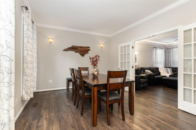 1001 Kingsway Dr, Apex, NC 27502 - dining area with french doors, ornamental molding, and dark wood finished floors