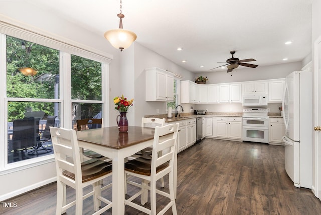 1001 Kingsway Dr, Apex, NC 27502 - dining room featuring a ceiling fan, dark wood-style flooring, and recessed lighting