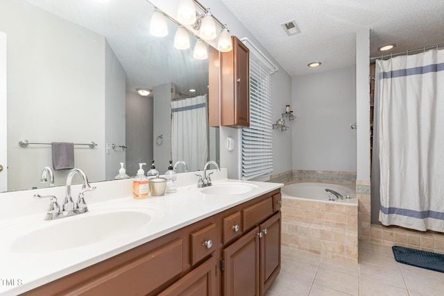 1001 Kingsway Dr, Apex, NC 27502 - bathroom featuring tile patterned floors, a garden tub, double vanity, curtained shower, and a textured ceiling