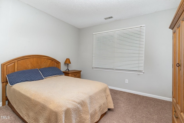 1001 Kingsway Dr, Apex, NC 27502 - bedroom featuring carpet and a textured ceiling