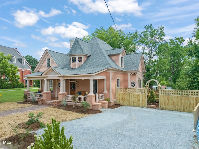 210 E Trinity Ave, Durham, NC 27701 - view of front of property featuring a shingled roof, a porch, and a gate