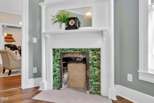 210 E Trinity Ave, Durham, NC 27701 - detailed view of wood finished floors and crown molding