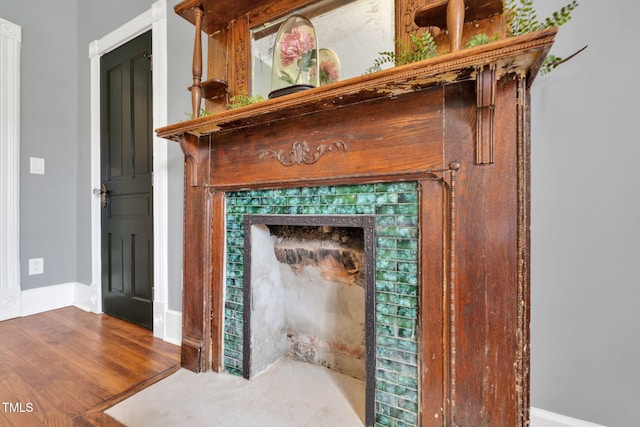 210 E Trinity Ave, Durham, NC 27701 - detailed view of wood finished floors and baseboards