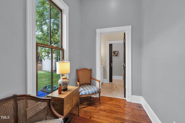 210 E Trinity Ave, Durham, NC 27701 - living area featuring baseboards and wood finished floors