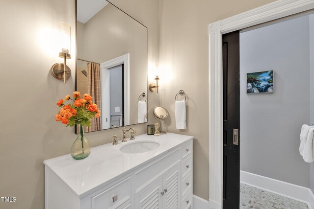 210 E Trinity Ave, Durham, NC 27701 - bathroom with vanity and baseboards