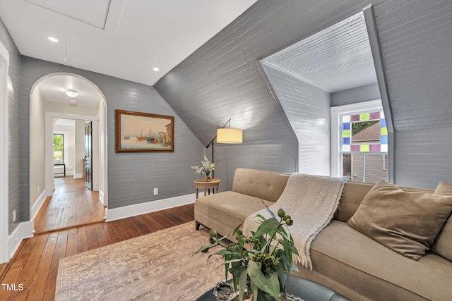 210 E Trinity Ave, Durham, NC 27701 - sitting room featuring hardwood / wood-style floors, plenty of natural light, attic access, arched walkways, and vaulted ceiling