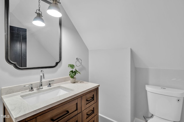 210 E Trinity Ave, Durham, NC 27701 - half bath featuring vanity and lofted ceiling