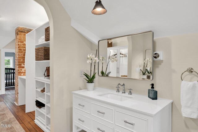 210 E Trinity Ave, Durham, NC 27701 - bathroom featuring vanity and hardwood / wood-style floors
