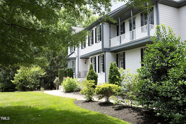 4217 Grahamstone Rd, Raleigh, NC 27610 - view of green lawn featuring a balcony