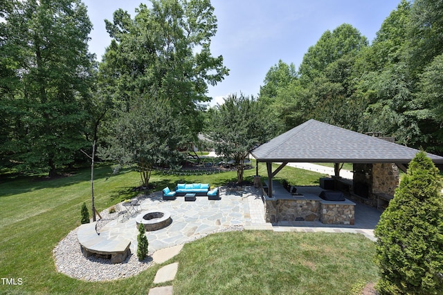 4217 Grahamstone Rd, Raleigh, NC 27610 - view of green lawn featuring a gazebo, a patio area, and an outdoor living space with a fire pit