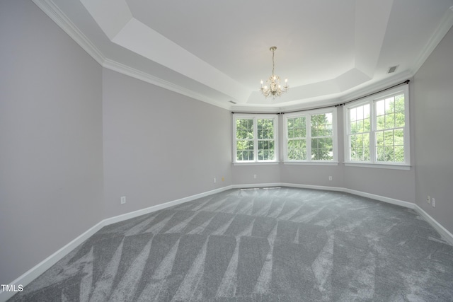 4217 Grahamstone Rd, Raleigh, NC 27610 - carpeted spare room with a raised ceiling, a chandelier, and crown molding