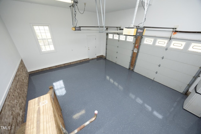 4217 Grahamstone Rd, Raleigh, NC 27610 - garage featuring a garage door opener